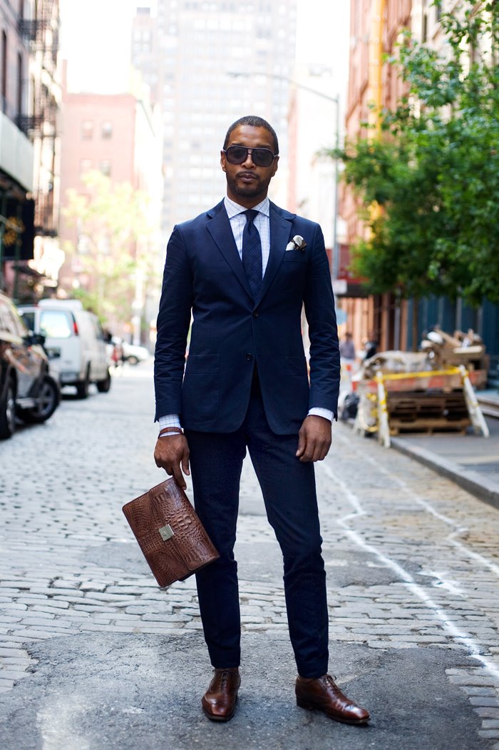 Wearing black shoes deals with navy suit